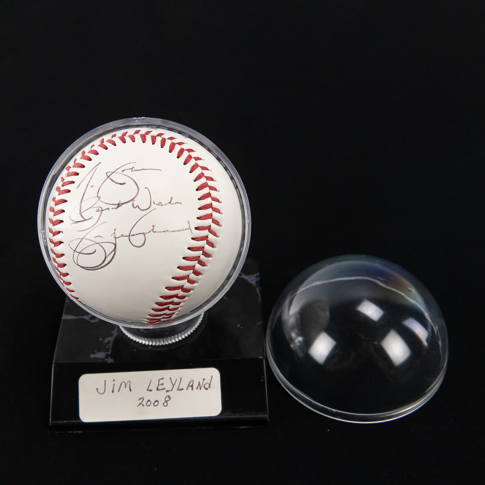 Jim Leyland Autographed Detroit Tiger MLB Baseball: Detroit Tigers & MLB Fan Favorite Jim Leyland Autographed 2008 Rawlings Detroit Tigers branded MLB baseball. Perfectly accented with personalized black ball ink signature and showcased in display. Fro