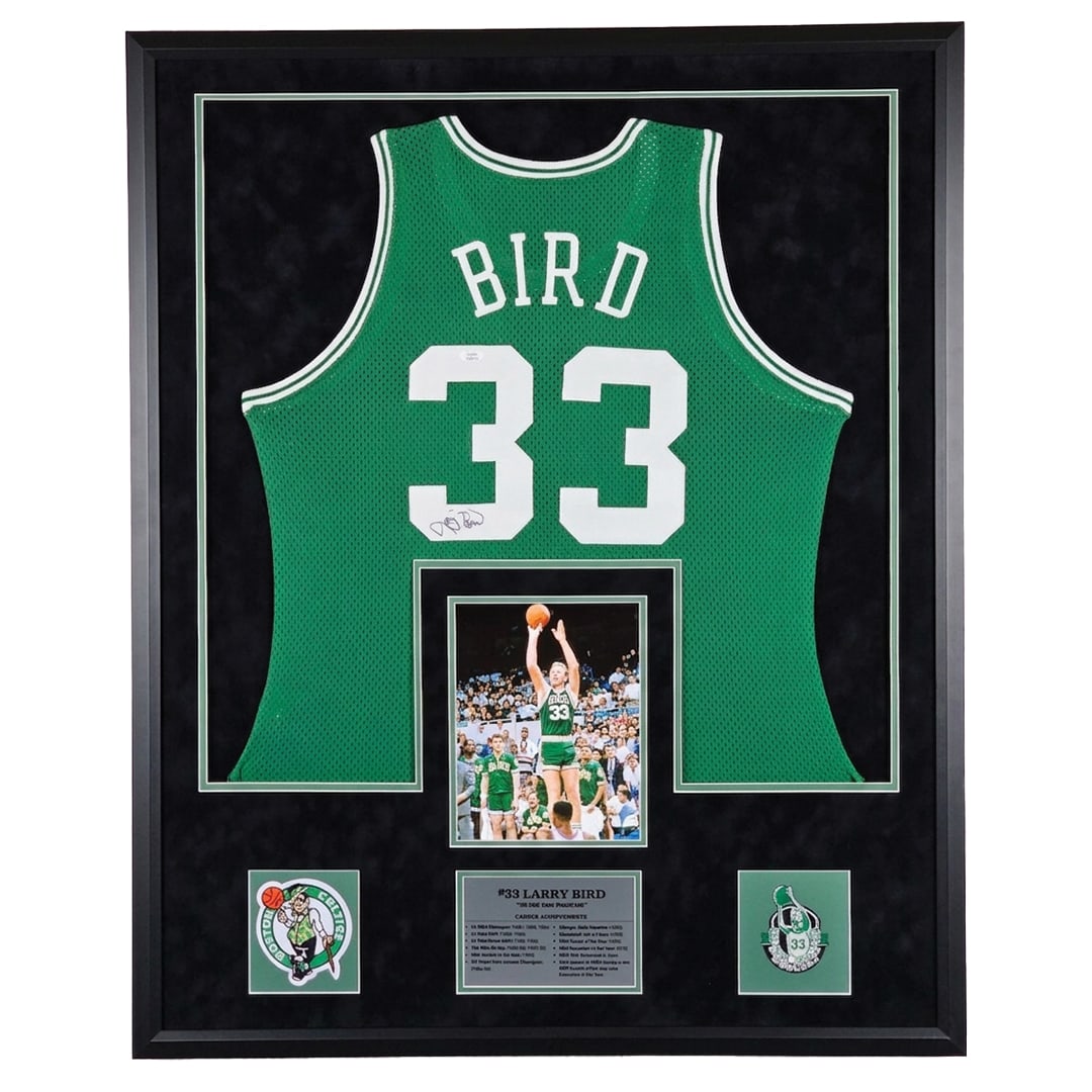 Larry Bird Autographed Framed Celtics Jersey: Larry Bird autographed Boston Celtics Jersey with JSA authentication. Bold black felt tipped signature, perfectly accented inside well constructed customized black frame with nameplate. From the Bobby