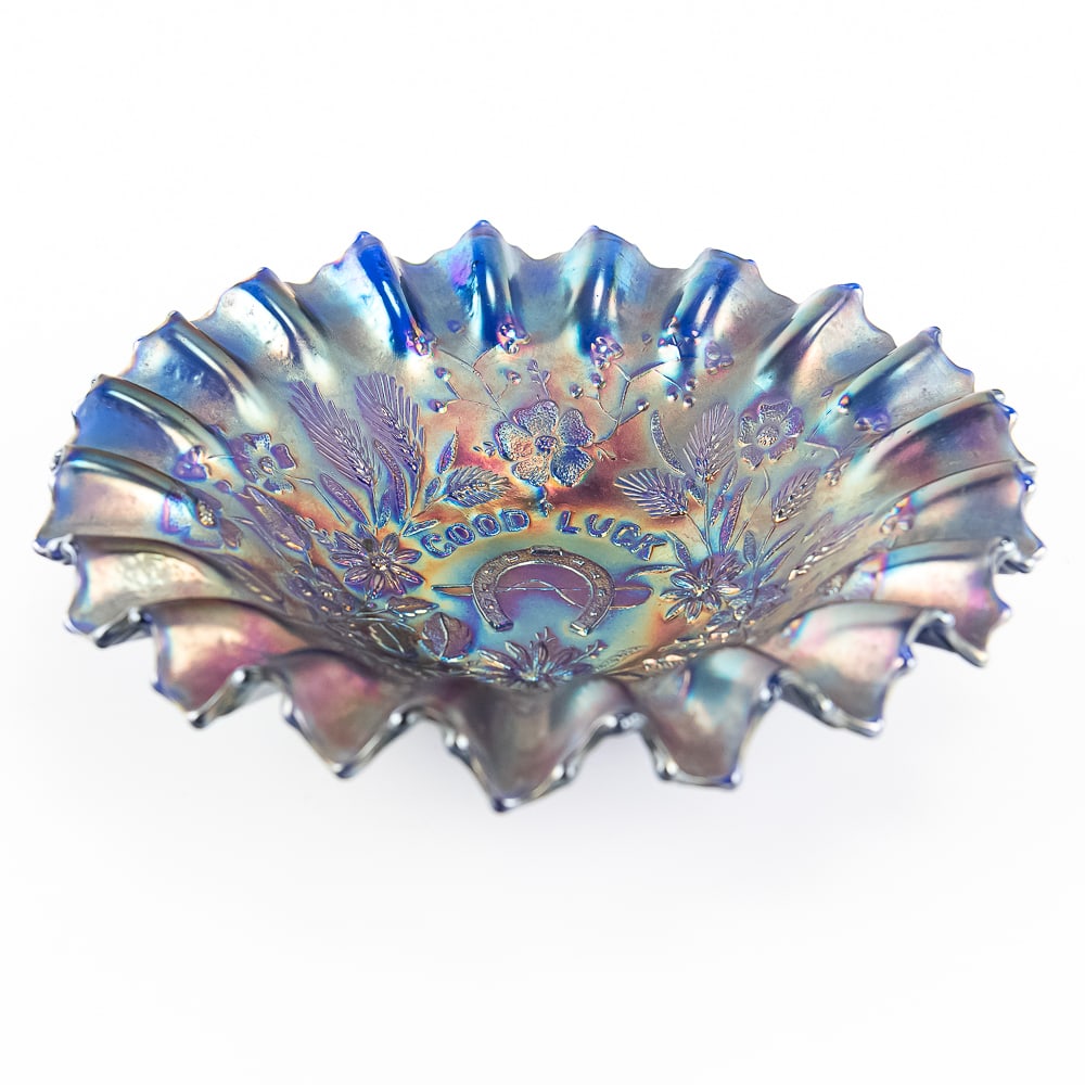 Carnival Glass: Northwood Good Luck Bowl: Blue. Iconic pie crust edge, ribbed back piece with great, even iridescence stretching to the edge. Good condition.See photos to judge condition and bid accordingly.