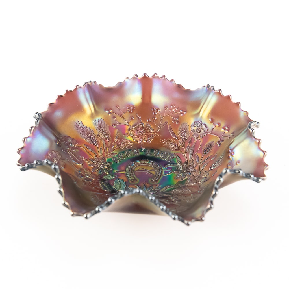 Carnival Glass: Northwood Good Luck Ruffled Bowl: Amethyst purple. A very pretty bowl with a plain back and bright, soft iridescence.See photos to judge condition and bid accordingly.8.75 in.