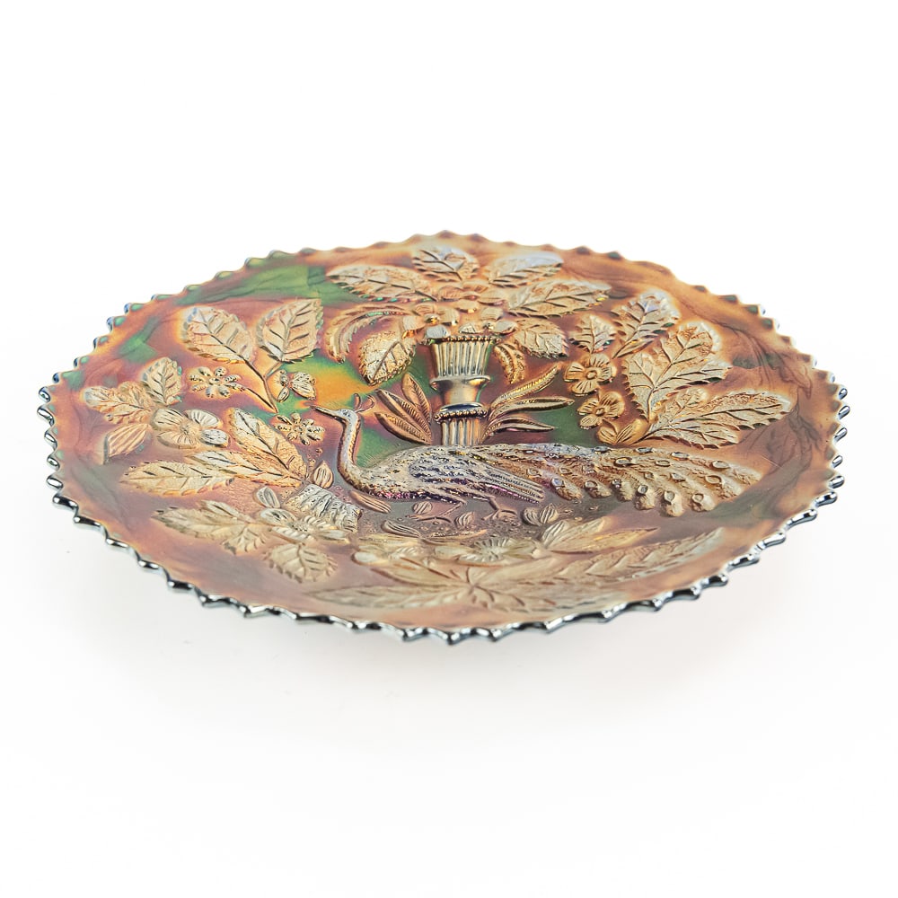 Carnival Glass: Fenton Peacock and Urn Plate: Blue. Features the bearded berry back pattern. Very nice color and great condition.See photos to judge condition and bid accordingly.9 in.