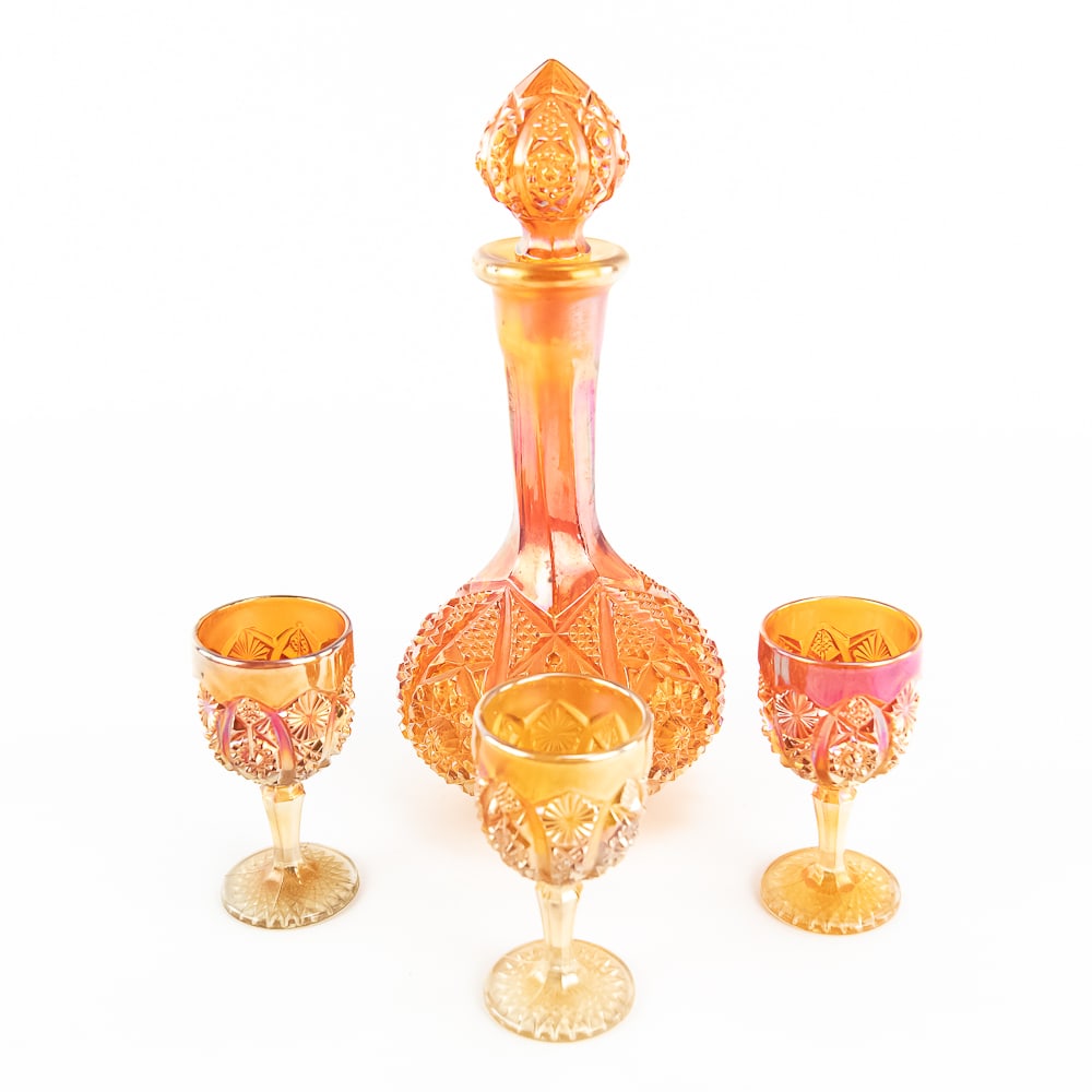 Carnival Glass: Imperial Decanter 4-Pc: 4-piece lot of Imperial Octagon in marigold. Decanter with stopper (chip on one edge) and three wines (all in good condition). See photos to judge condition and bid accordingly.