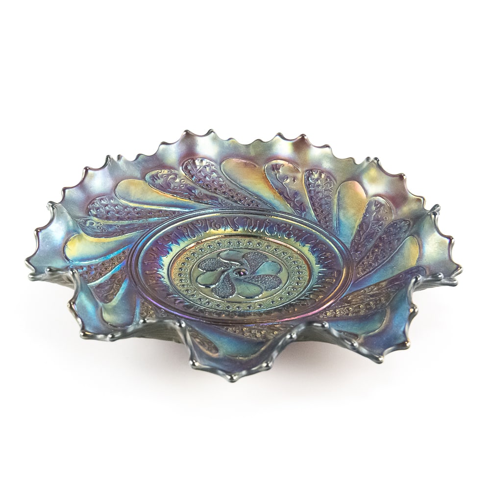 Carnival Glass: Dugan Roundup Low Ruffled Bowl: Purple with electric iridescence. An absolutely beautiful bowl featuring a basket weave back. See photos to judge condition and bid accordingly.