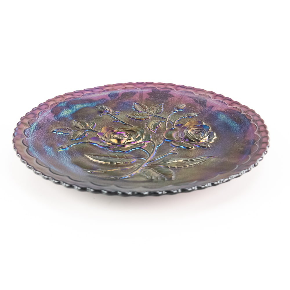 Carnival Glass: Imperial Open Rose Plate: Purple plate with a well-iridized front and an un-iridized back. Has a couple of tiny flakes on the base.See photos to judge condition and bid accordingly.9 in.
