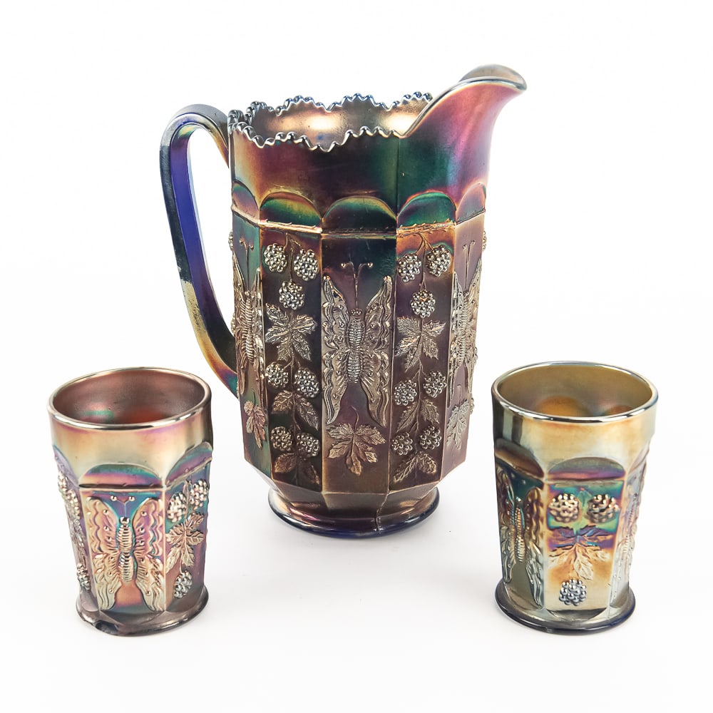 Carnival Fenton Butterfly & Berry 3pc Water Set: Blue. Pitcher and tumblers. One tumbler has a chip on the bottom; otherwise, the set is in very good condition.See photos to judge condition and bid accordingly.