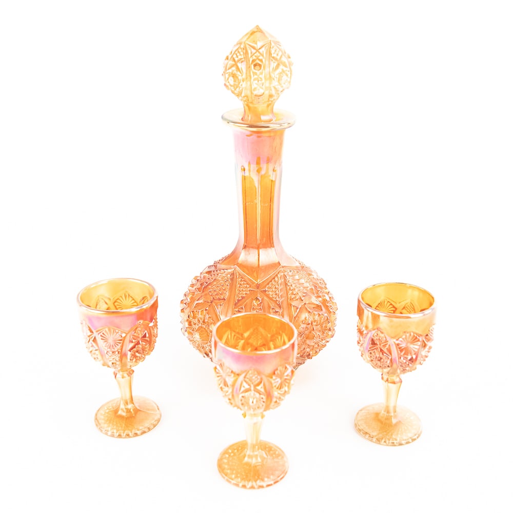 Carnival Glass: Imperial Decanter 4-Pc: 4-piece lot of Imperial Octagon in marigold. Decanter with stopper (normal tiny flake on the stopper) and three wines. In great shape. See photos to judge condition and bid accordingly.