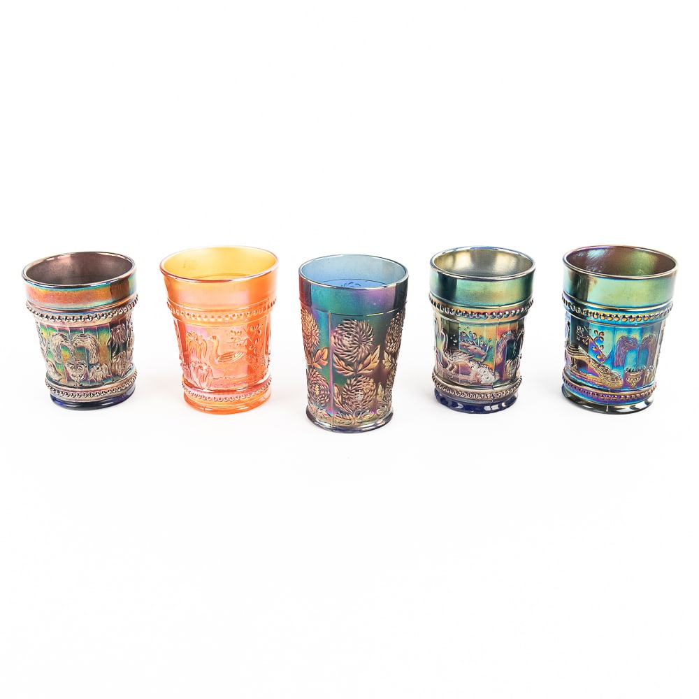 Carnival Glass: Tumblers 5-Pc Lot: 5-piece lot of tumblers. Northwood Peacock at the Fountain in marigold (very nice shape and iridescence). Northwood Peacock at the Fountain in amethyst (amazing iridescence, no damage). Fenton 10 Mums