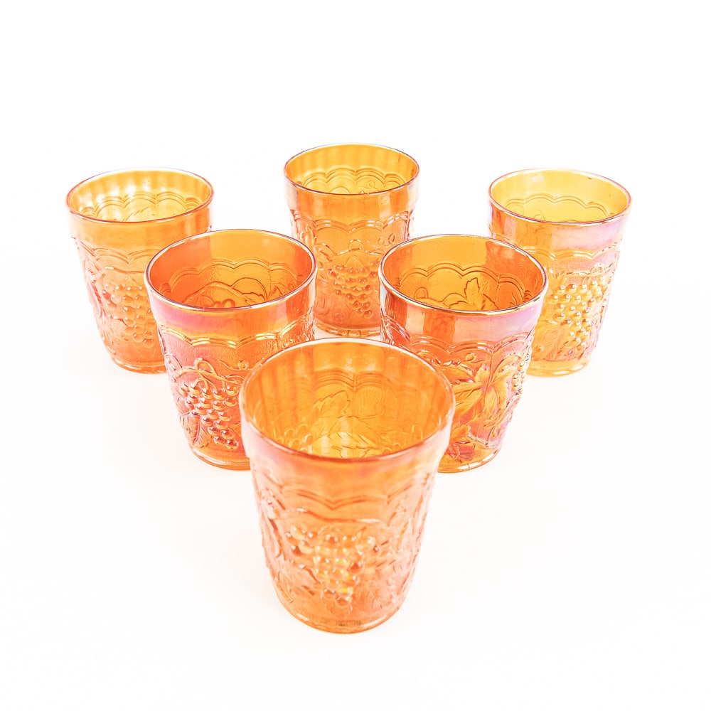Carnival Glass: Imperial Tumblers 6-Pc: 6-piece lot of Imperial Grape tumblers in marigold. Three are ribbed on the inside and three are not. Two of the non-ribbed tumblers have base damage. See photos to judge condition and bid accordingly