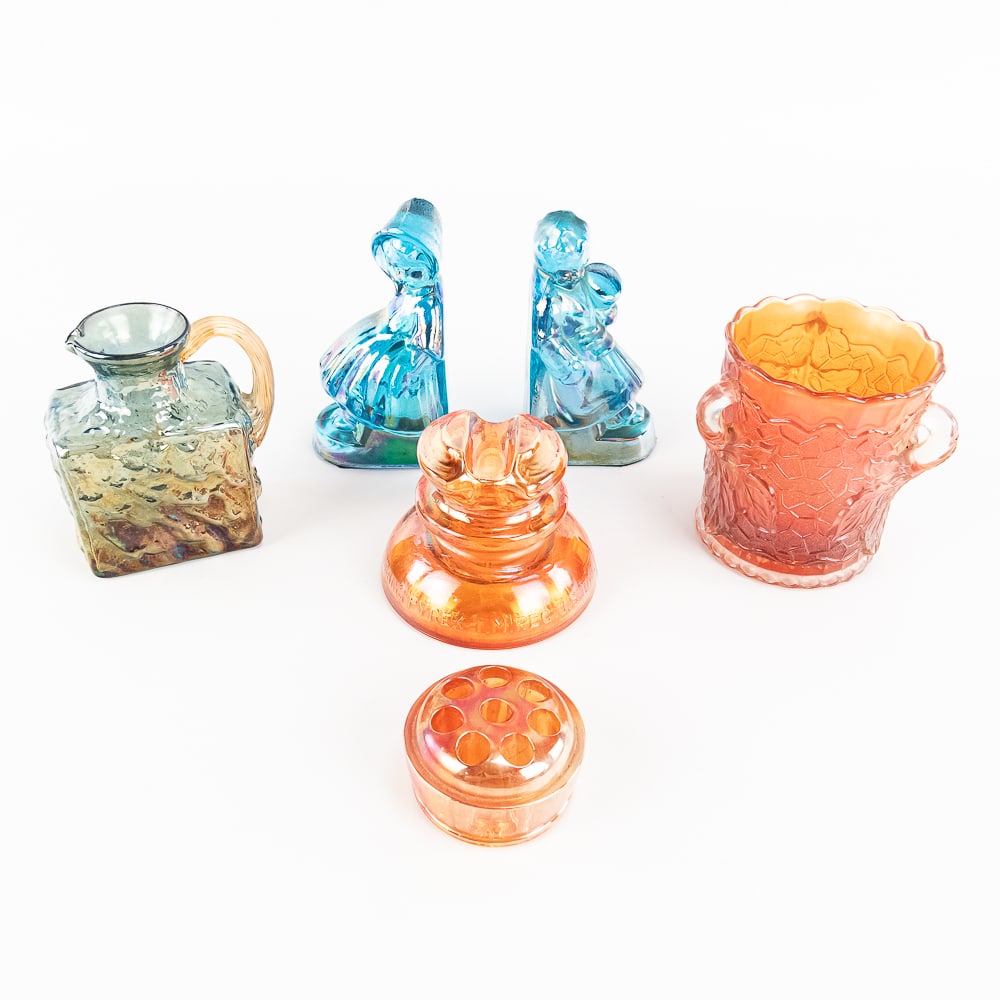Carnival Glass: Assortment 6-Pc Lot: 6-piece lot. Dugan Maple Leaf spooner in marigold (fine condition). 8-hole flower frog in marigold. Corning Pyrex insulator in marigold. Pilgrim Glass Nugget handled pitcher in aqua with a heavy marig