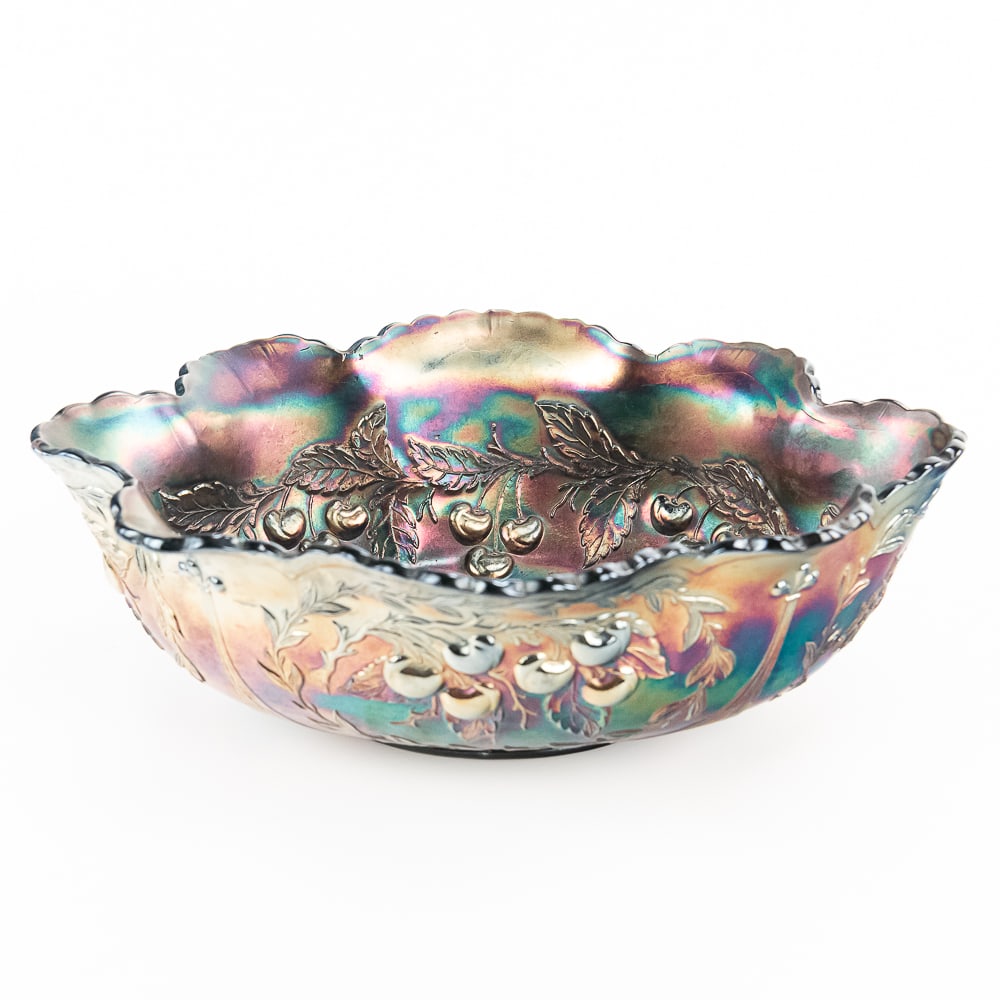 Carnival Glass: Dugan Peach & Pear Large Oval Bowl: Black amethyst. A very unusual color with nice iridization and no damage. 13" long. See photos to judge condition and bid accordingly.12.5 in.