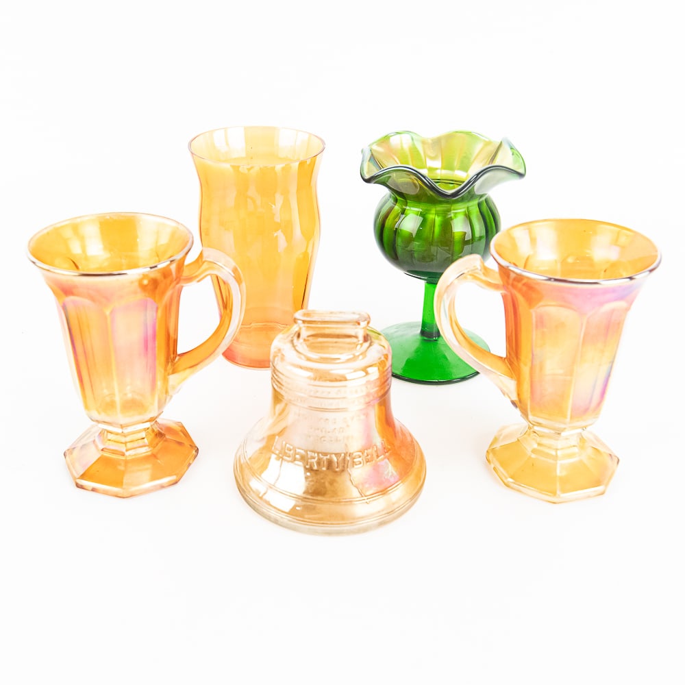 Carnival Glass Mixed Assortment: 5-Pc: Includes an Imperial tumbler etched 'Compliments of Bloom Department Store 54th Anniversary 1930' in marigold (flake chips around top edge), a Fenton Small Rib crimped compote in green (no damage, pre
