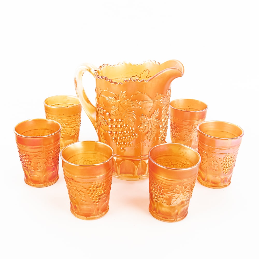 Carnival Glass: N'wood Grape Set 7-Pc: Northwood Grape and Cable 7-piece water set in marigold. Standard size pitcher with thumbprint base and six tumblers. Great condition with beautiful iridescence. See photos to judge condition and bid 