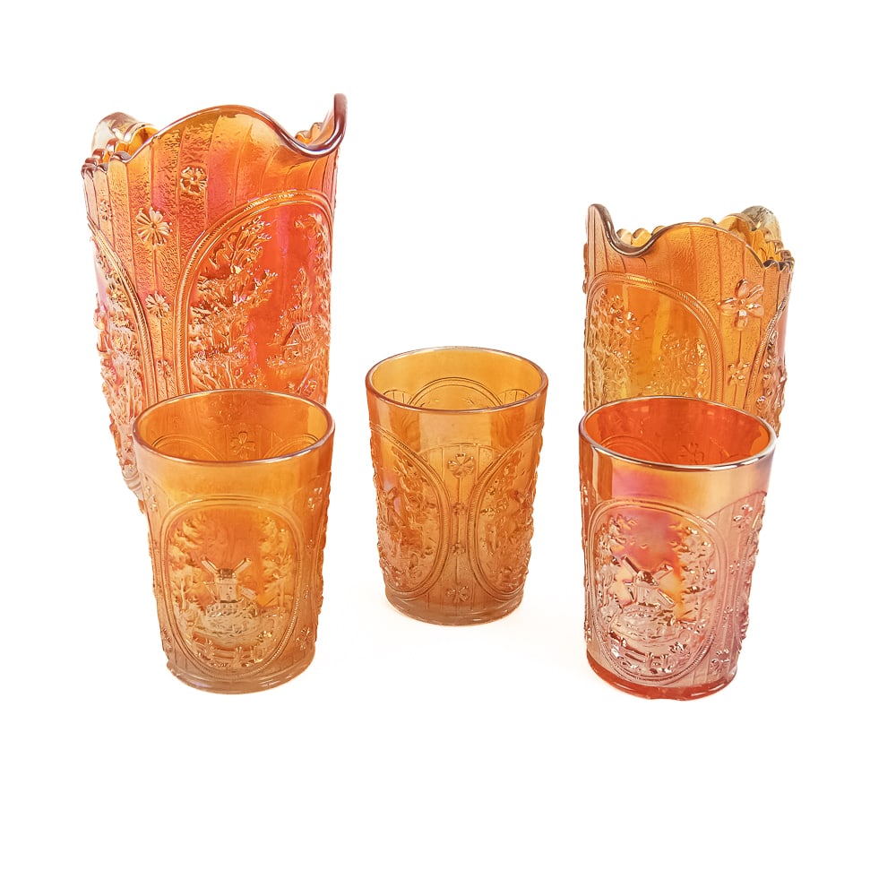 Carnival Glass: Imperial Windmill 5-Pc: 5-piece lot of Imperial Windmill in marigold. Water pitcher (8 1/4 in tall, base damage, roughness, and peeling). Milk pitcher (7 in tall, good condition). Three tumblers (one is good, two have base c