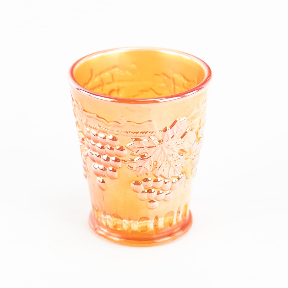 Carnival Glass: Northwood Grape & Cable Shot Glass: Marigold. Very nice color and very good condition.See photos to judge condition and bid accordingly.