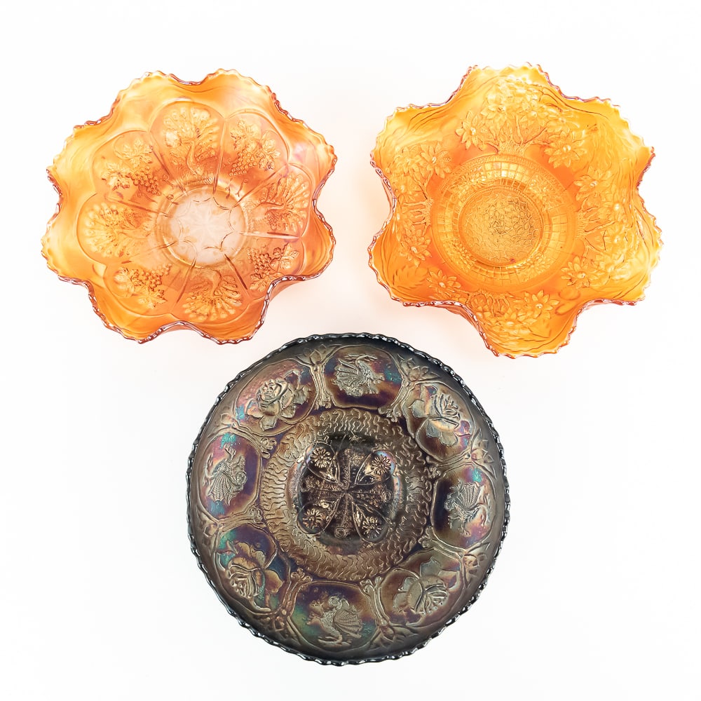 Carnival Glass: Fenton Bowls 3pc Lot: Includes a blue ice cream shaped Dragon and Lotus bowl, a marigold ruffled Peacock and Grape bowl (has an in-the-making piece of silica in the base, no harm), and an absolutely beautiful marigold Oran