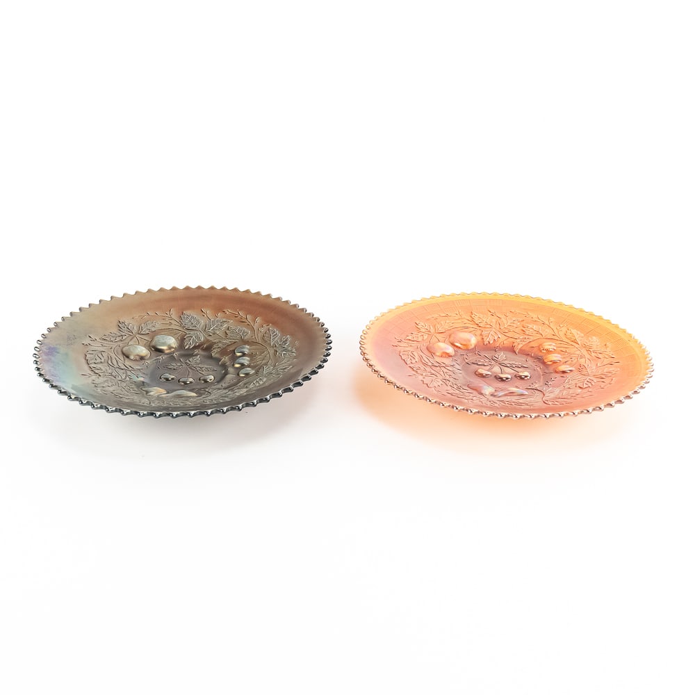 Carnival Glass: Fenton Three Fruits Plates 2pc Lot: Includes one marigold plate with a basketweave back (great condition and color) and one amethyst purple plate with a basketweave back (good condition).See photos to judge condition and bid accordingly
