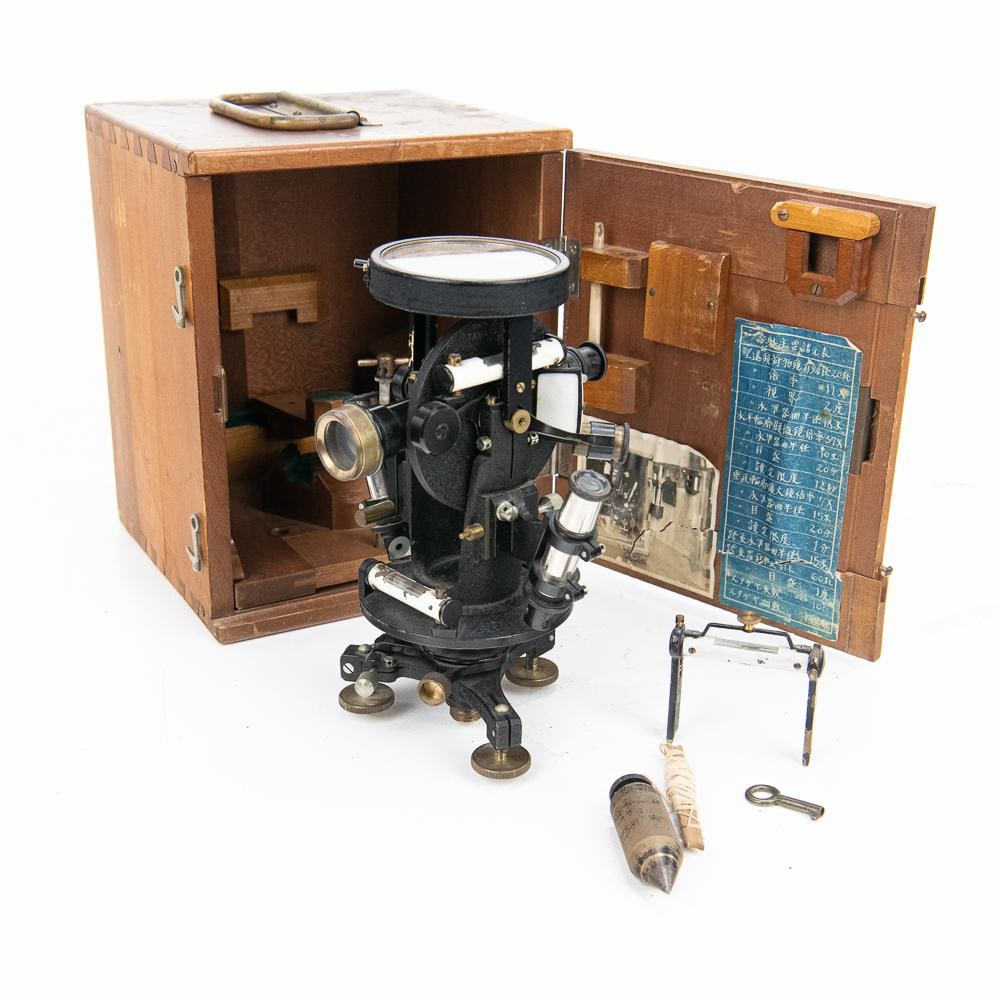 Tamaya & Co. Japanese WWII Theodolite: This rare WWII-era Japanese theodolite, manufactured by the renowned Tamaya & Co. in Ginza, Tokyo (Serial No. 31), is a precision surveying instrument modeled after the German Hildebrandt design. Duri