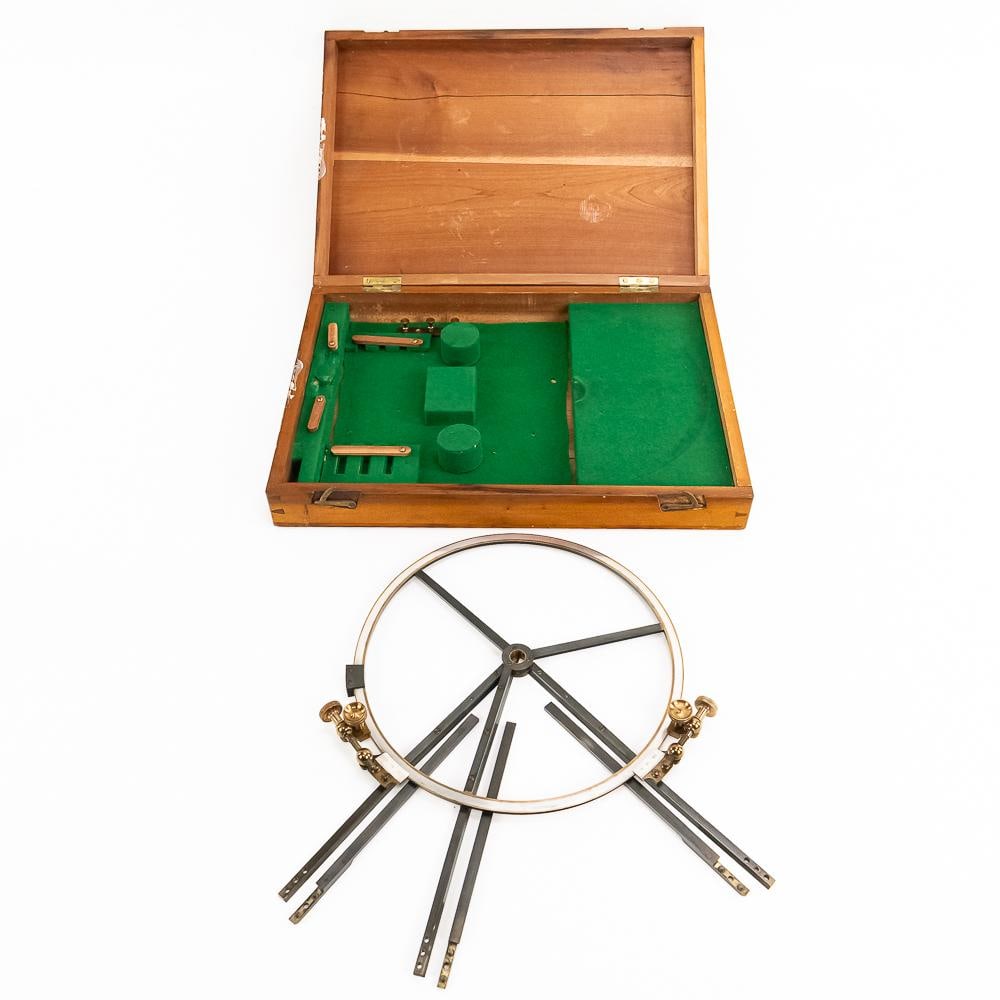 Antique Brass Three-Arm Station Pointer: This exquisite maritime navigation instrument is an antique brass three-arm station pointer, also known as a station pointer or protractor, resting securely inside its original fitted wooden