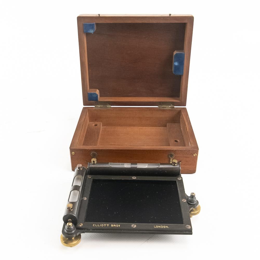 Elliott Bros London Artificial Horizon: This 19th-century scientific instrument by renowned maker Elliott Bros of London is a classic brass and black glass artificial horizon, historically used for navigational and surveying observations