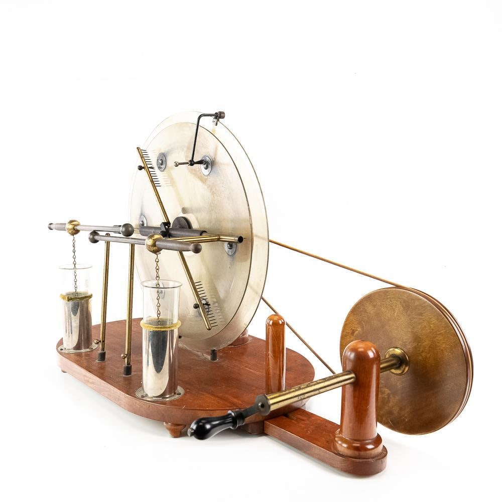 Unsigned Antique Voss-Style Influence Machine: This exceptional late 19th to early 20th-century unsigned electrostatic influence machine is a spectacular piece of early scientific laboratory demonstration apparatus. Exhibiting the scarce