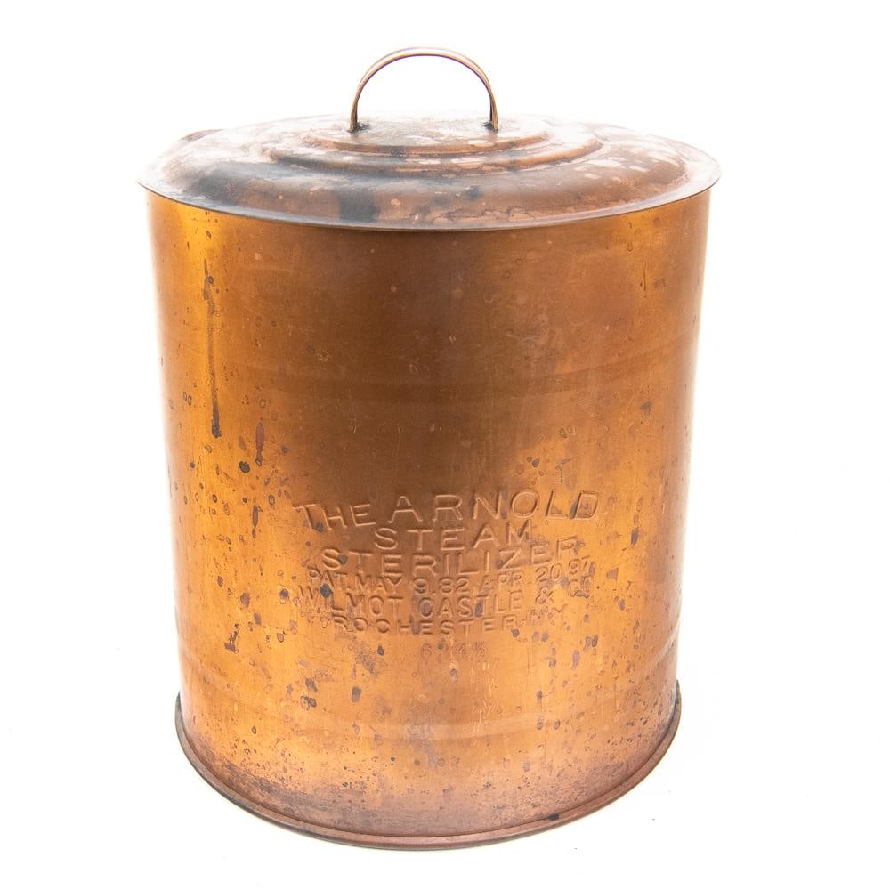 Arnold Copper Steam Sterilizer Top: This antique Arnold Steam Sterilizer upper chamber, manufactured by Wilmot Castle & Co. of Rochester, NY, is a striking piece of turn-of-the-century medical equipment. Based on the visible patent