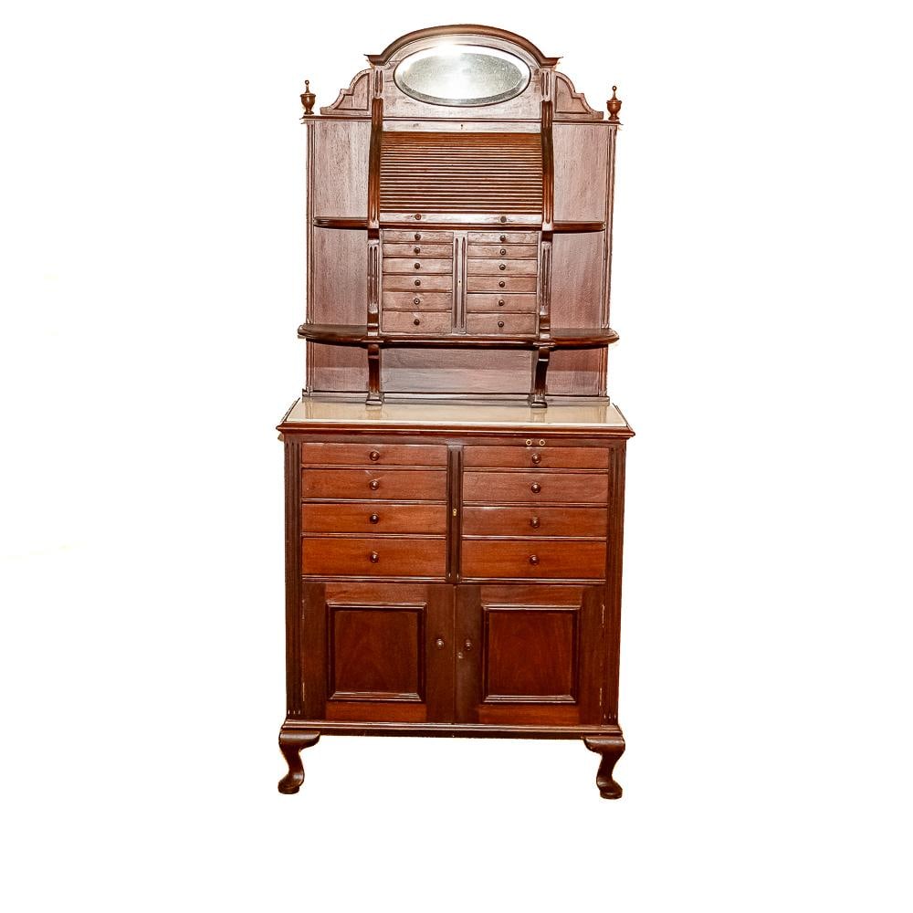 Antique Dental Cabinet with Vitrolite Top: This magnificent turn-of-the-century dental cabinet is a spectacular example of early 20th-century professional trade furniture, crafted from rich, dark-stained