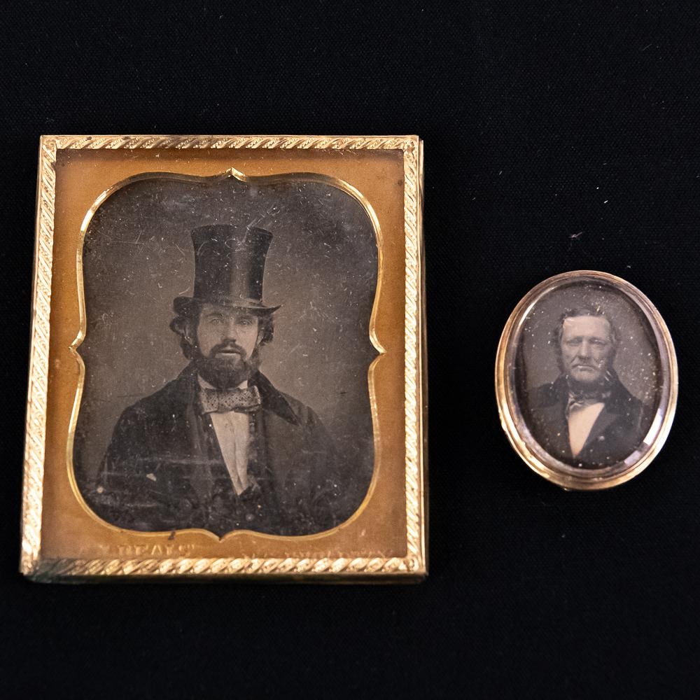 2 Daguerreotypes 1/6 Plate & Brooch: Lot of 2 Dag images one being an oval gem size image of an older well dressed man mounted as a brooch in a silver plated case. The pin for the brooch is missing. Also includes an uncase image of a