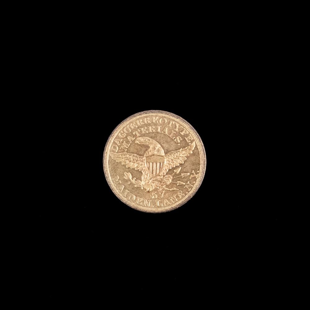 Scovill Brass Daguerreotype Token: Brass token for Scovill Mfg. Co. 57 Maiden Ln., N.Y. makers of Daguerreotype materials. In VG condition with reed edge. Measures 1" diameter. From the Allen Koenigsberg collection.