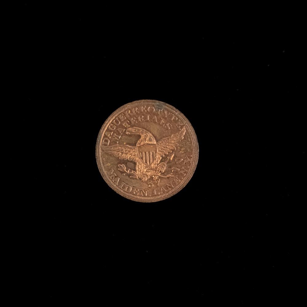 Scoville Daguerreotype Materials Copper Token: Copper token for Scoville Mfg 57 Maiden Lane, N.Y. makers of Daguerreotype materials. In VG condition with reeded edge. Measures 1" diameter. From the Allen Koenigsberg collection.