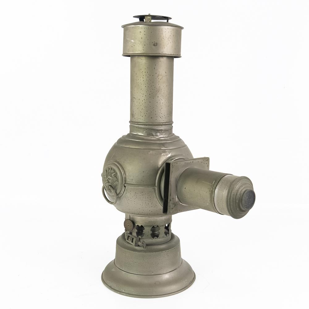 French Odin Merveilleux Magic Lantern Projector: This charming 19th-century French "Odin Merveilleux" magic lantern projector is a wonderful piece of early optical entertainment. Crafted of metal with a bright nickel finish, this piece features a