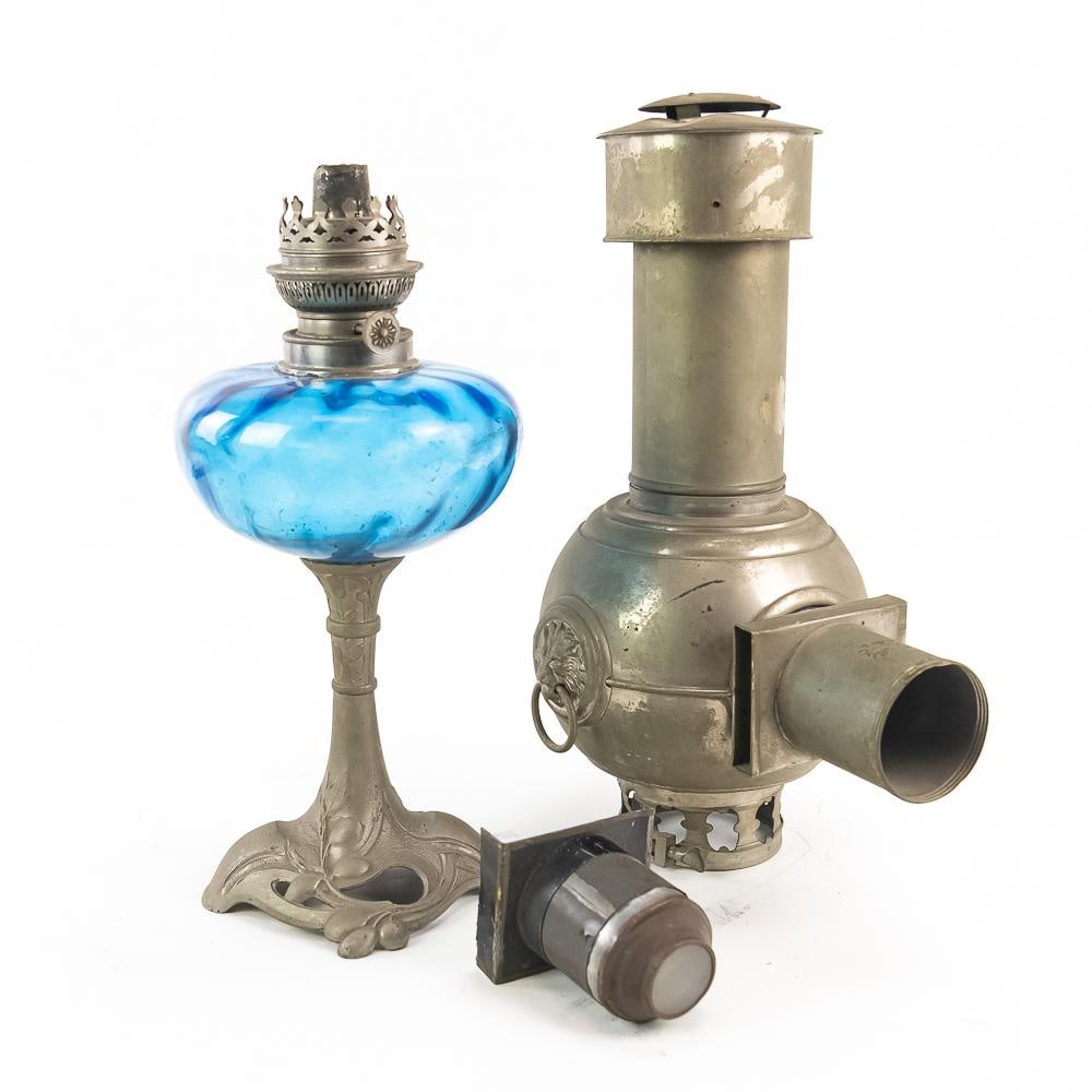 Magic Lantern Projector Lamp w/Oil Lamp Base: This fascinating antique optical projection piece merges a metal upper magic lantern housing with a vibrant blue glass oil lamp base featuring a floral plant motif, attributed to Odin Merlo. The
