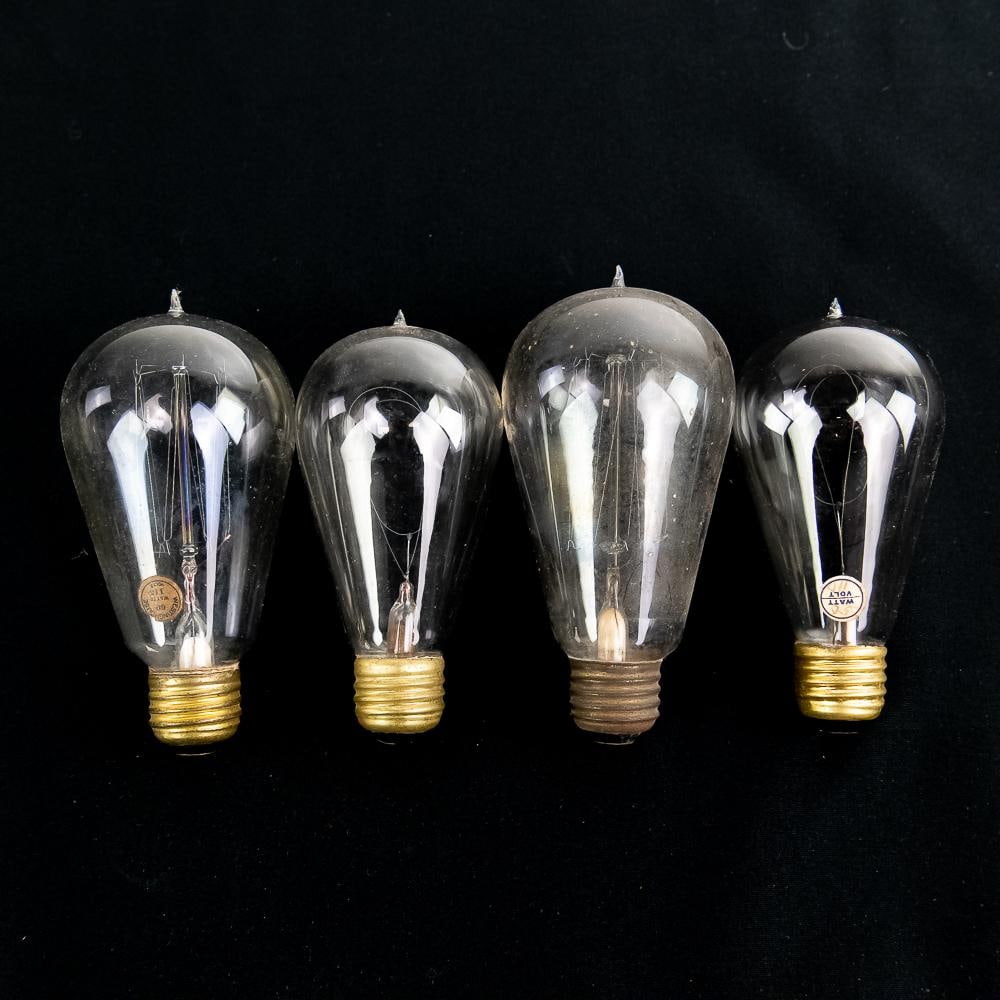 4 Vintage Tipped Light Bulbs Westinghouse: Step back into the golden age of early electrical illumination with this exceptional lot of four antique tipped glass incandescent light bulbs, dating to the early 20th century. Crafted with standard