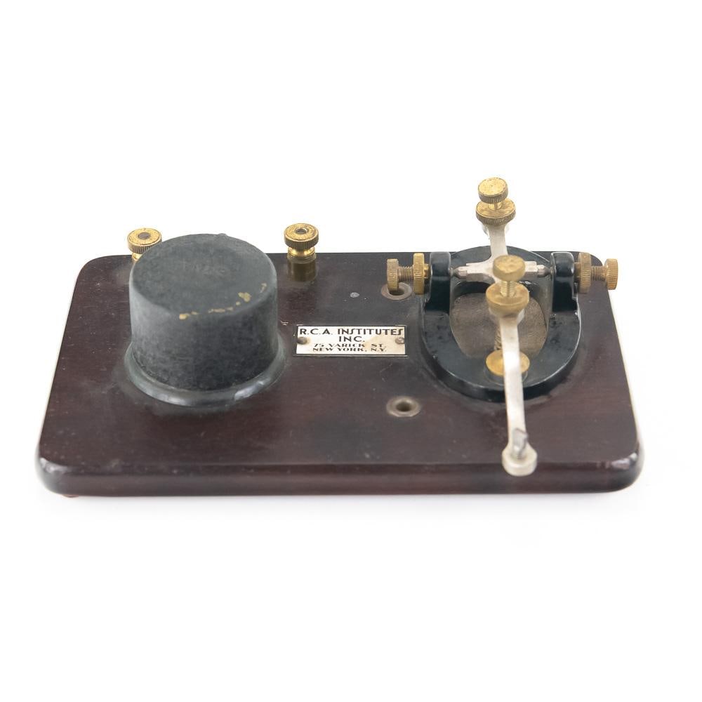 Vintage RCA Telegraph Practice Key Set: This vintage mid-20th century Morse code practice key set was distributed by R.C.A. Institutes Inc. of New York, N.Y., featuring a Signal Electric Mfg. Co. model R-68 practice buzzer and telegraph key