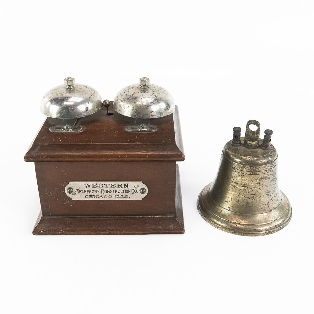 Western Elec Bell Box and Electric Bell Ringer: Telephone magneto ringer box featuring dual nickel-plated brass bells mounted on a handsome finished wood case with three rear-mounted binding posts, proudly bearing its original front manufacturer's