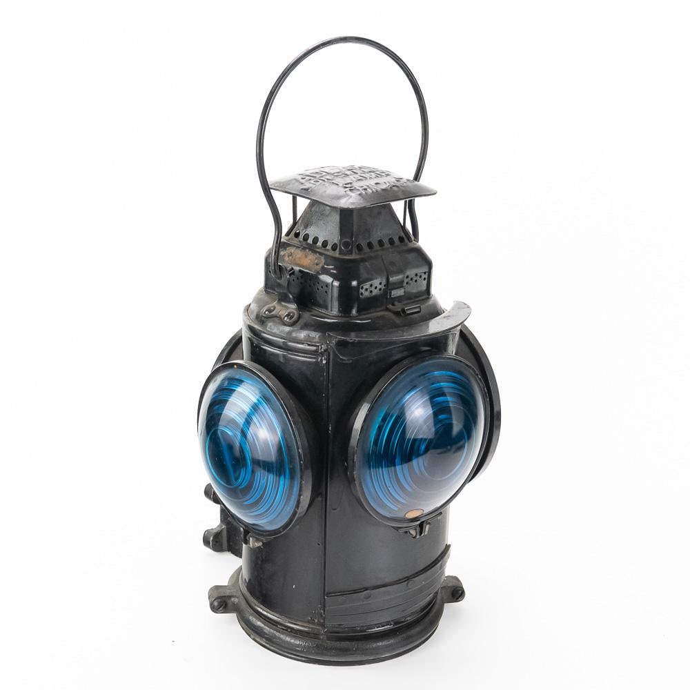 Adlake Non-Sweating Switch Signal Lamp-Right: This early 20th-century Adams & Westlake Co. (Adlake) "Non-Sweating Lamp" Chicago railroad switch signal lantern features a heavy black painted steel frame, four colored glass Fresnel bullseye lenses