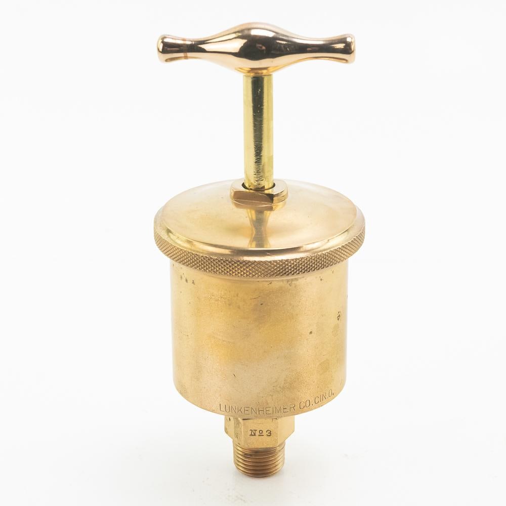 Lunkenheimer No. 3 Brass Grease Cup w T Handle: Lunkenheimer brass grease cup in very good condition. It is approximately 7" inches tall and the brass cylinder cup is about 3" inches wide. The "T" handle is in good condition and works smooth and