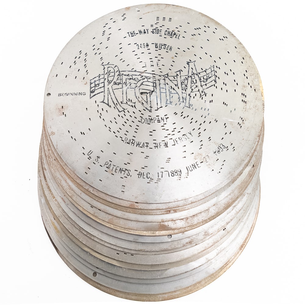 15 Regina Music Box Discs 11" Diameter: 15 Regina music box discs. 11” diameter. Please see photos for titles and condition. From the Meekins Collection.
