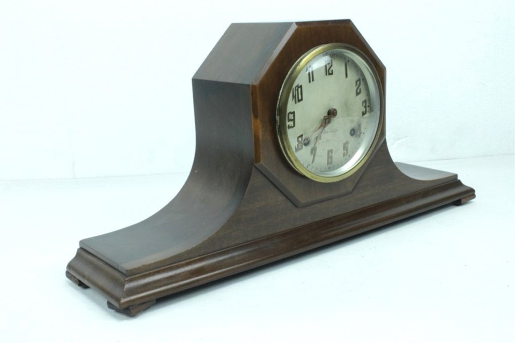 Vintage New Haven Wood Mantle Clock: 9 3/4 H x 19 1/2 wide. Condition Has surface scratches.