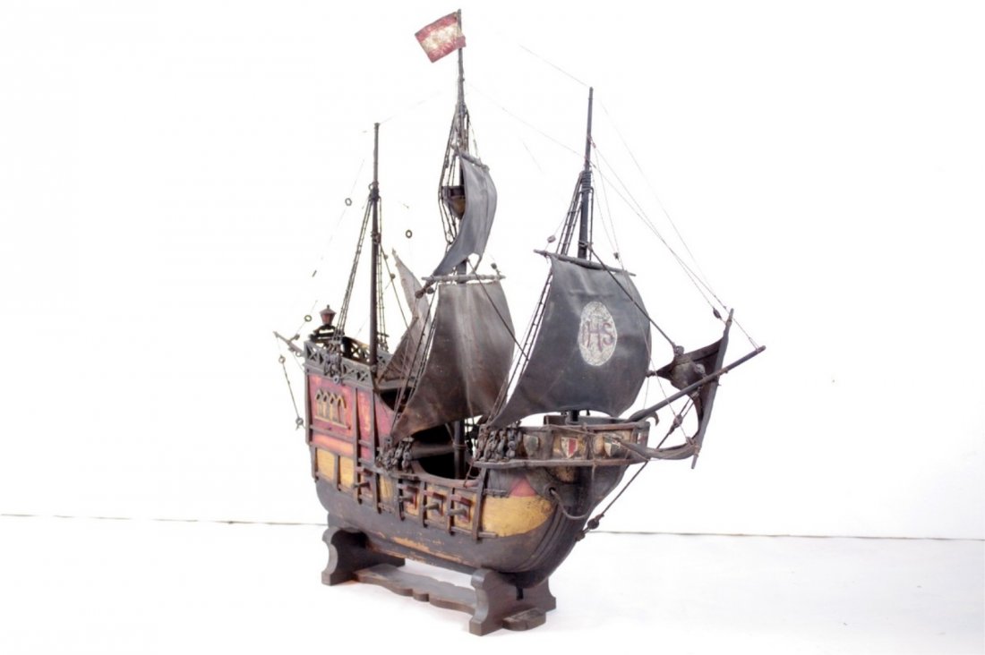 Folk Art 16th Century Spanish Galleon Model: Having wood hull, canvas sails, full rigging and armed with 10 cannons. Base is marked "Germany". Resting on display base. Needs cleaning, paint loss on bottom and sides of hull. Some loose and missin