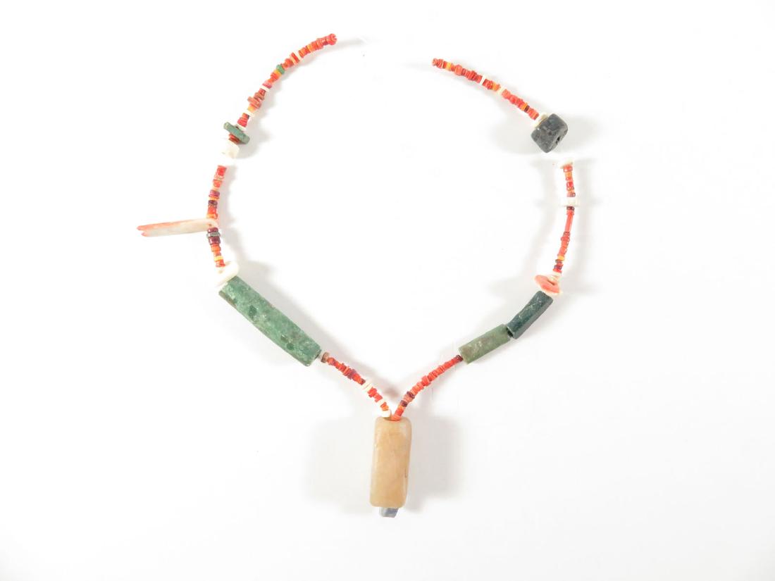 Pre Columbian Necklace Beads Alabaster Pendant: TYPE:Antiques SUB TYPE:Jewelry REGION:South America SUB REGION: MEDIUM: SGD/UNS: TITLE:Pre Columbian Necklace Beads Alabaster Pendant CATALOG NOTES: Pre Columbian type green and red stone ? necklace w