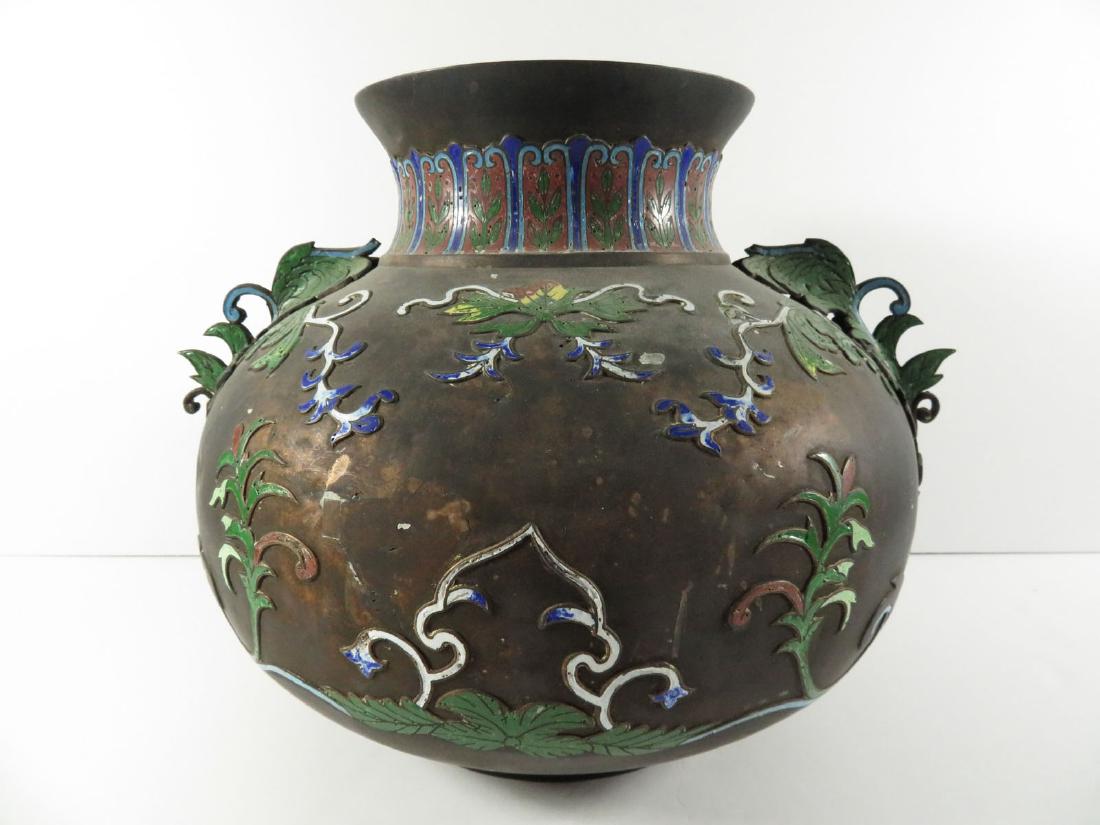 Chinese Bronze Champleve Floral Planter: TYPE:Antiques SUB TYPE:Planter REGION:Asia SUB REGION:China MEDIUM:Bronze SGD/UNS: TITLE:Chinese Bronze Champleve Floral Planter CATALOG NOTES:A fine Chinese bronze with champleve enamel planter. Has