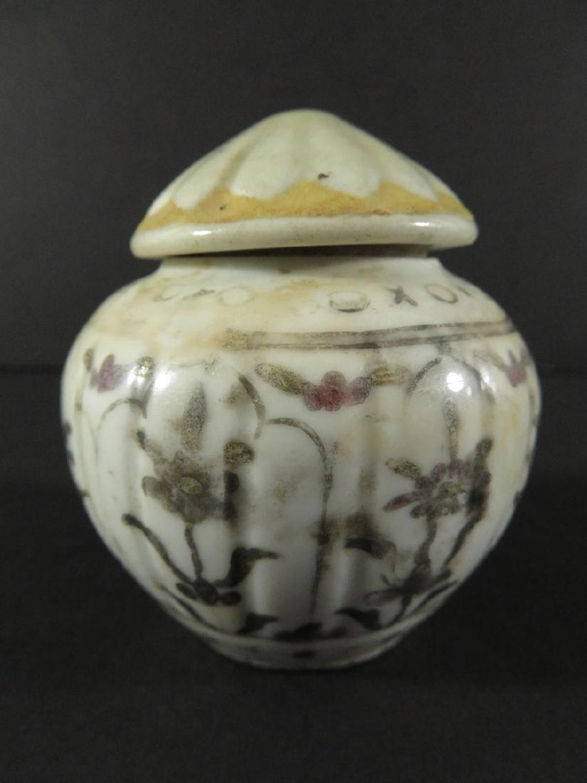 Vietnamese Painted Porcelain Lidded Pot: TYPE:Antiques SUB TYPE:Pot REGION:Asia SUB REGION:Vietnam MEDIUM:Porcelain SGD/UNS:Unsigned TITLE:Vietnamese Painted Porcelain Lidded Pot CATALOG NOTES:A small Asian lidded pot with painted floral dec
