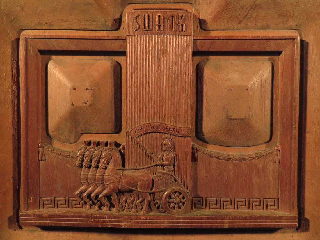 Bas Relief Wood Panel Quo Vadis Jewelry Swank: TYPE:Art SUB TYPE:Sculpture REGION:US SUB REGION:Massachusetts MEDIUM:Wood SGD/UNS: TITLE:Bas Relief Wood Panel Quo Vadis Jewelry Swank CATALOG NOTES:An Art Deco period and style wood carving in bas r