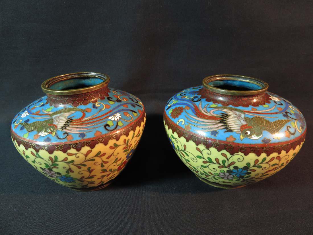 Japanese Cloisonne Pr Sm Pheonix Butterfly Jars: TYPE:Antiques SUB TYPE:Vase REGION:Asia SUB REGION:Japan MEDIUM:Cloisonne SGD/UNS: TITLE:Japanese Cloisonne Pr Sm Pheonix Butterfly Jars CATALOG NOTES:Two similar small Japanese Meiji period cloisonne
