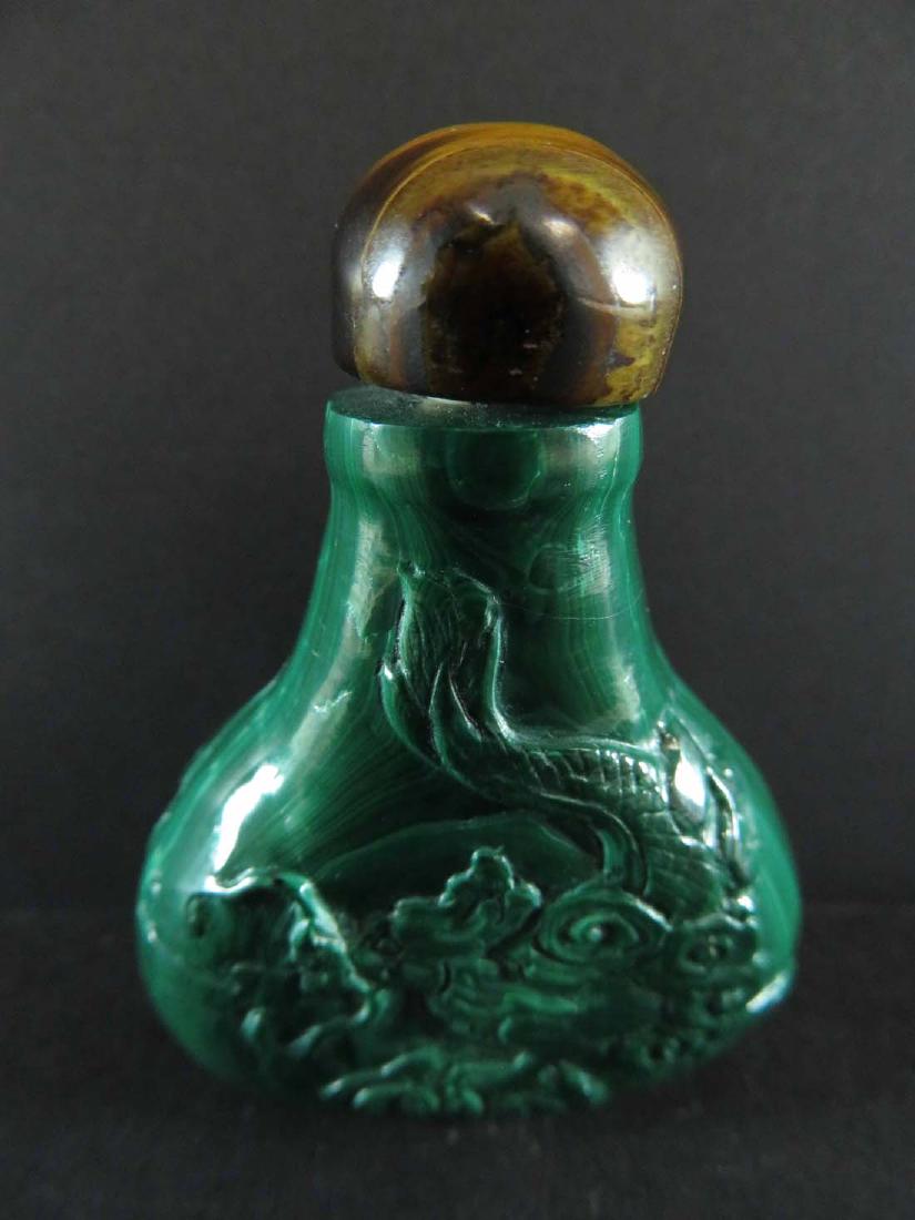 Chinese Snuff Bottle Malachite Carved Fish w/ Dragon: TYPE:Antiques SUB TYPE:Snuff Bottle REGION:Asia SUB REGION:China MEDIUM:Malachite SGD/UNS: TITLE:Chinese Snuff Bottle Malachite Carved Fish w/ Dragon CATALOG NOTES: INSIDE HEIGHT: INSIDE WIDTH: OUTSID