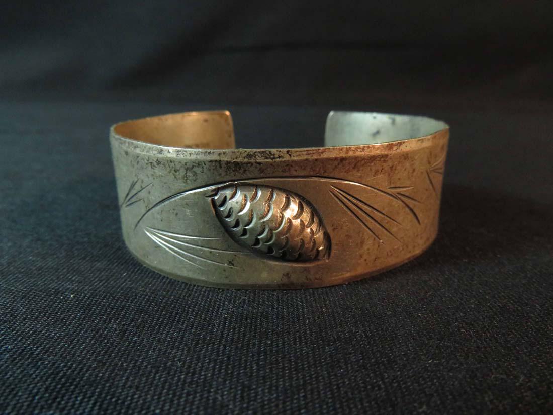 Bracelet Sterling Stuart Nye Pine Cone Cuff: TYPE:Antiques SUB TYPE:Jewelry REGION: SUB REGION: MEDIUM: SGD/UNS:Signed TITLE:Bracelet Sterling Stuart Nye Pine Cone Cuff CATALOG NOTES: INSIDE HEIGHT: INSIDE WIDTH: OUTSIDE HEIGHT:6.125 OUTSIDE WID