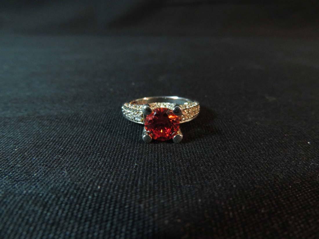 Ring Orange Garnet Sterling 925 W/ Diamond Accent: TYPE:Antiques SUB TYPE:Jewelry REGION: SUB REGION: MEDIUM: SGD/UNS: TITLE:Ring Orange Garnet Sterling 925 W/ Diamond Accent CATALOG NOTES: INSIDE HEIGHT: INSIDE WIDTH: OUTSIDE HEIGHT: OUTSIDE WIDTH: O