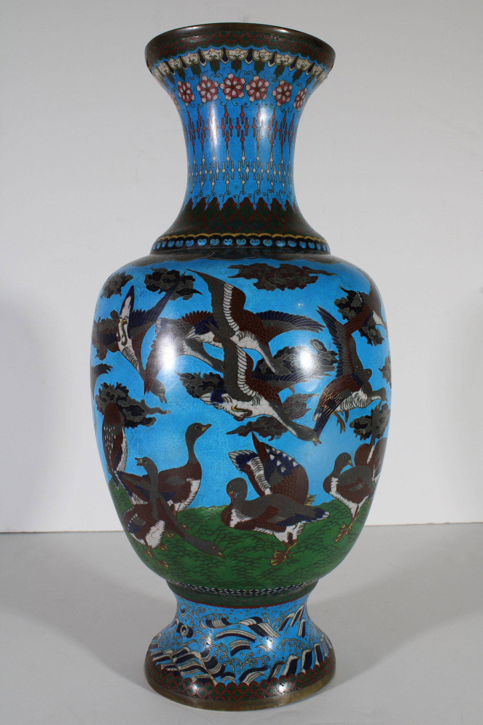 Meiji Japanese Cloisonne 14.75" Vase Many Ducks: DESCRIPTION: A fine and large 14.75 inch tall early Meiji era Japanese cloisonne vase. It features an overall design of dozens of geese in flight and on the ground. Set against a bright medium blue ba