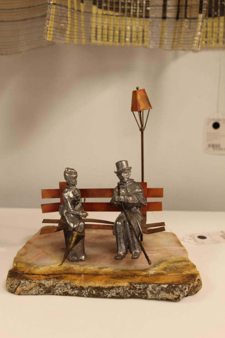 Jere Style Table Sculpture on Marble Couple on Bench: FOR YOUR CONSIDERATION IS A WONDERFUL PEWTER AND COPPER ON MARBLE JERE STYLE SCULPTURE. THIS SCULPTURE IS IN EXCELLENT CONDITION WITH NO VISIBLE FLAWS. DIMENSIONS: W 8.5", D 7", H 8.5"