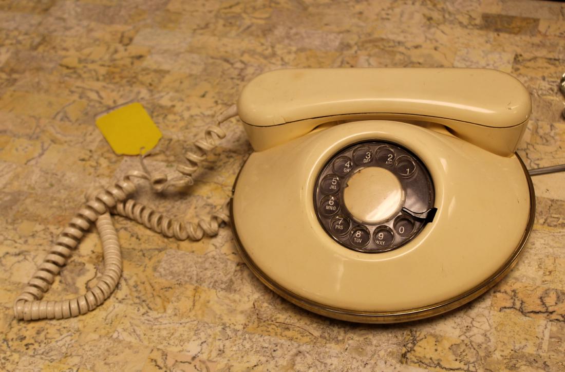 Retro Round Northern Telecom Rotary Telephone: For your consideration is a vintage, white plastic, rotary telephone. In good condition. The dimensions are 18" W x 8.5" D x 4" H.